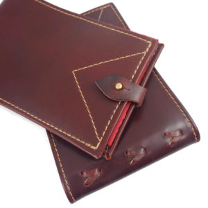 leather photo album brag book - close-up view of front closure and back binding weave